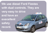 We use diesel Ford Fiestas with dual controls. They are very easy to drive and have an exellent safety record.